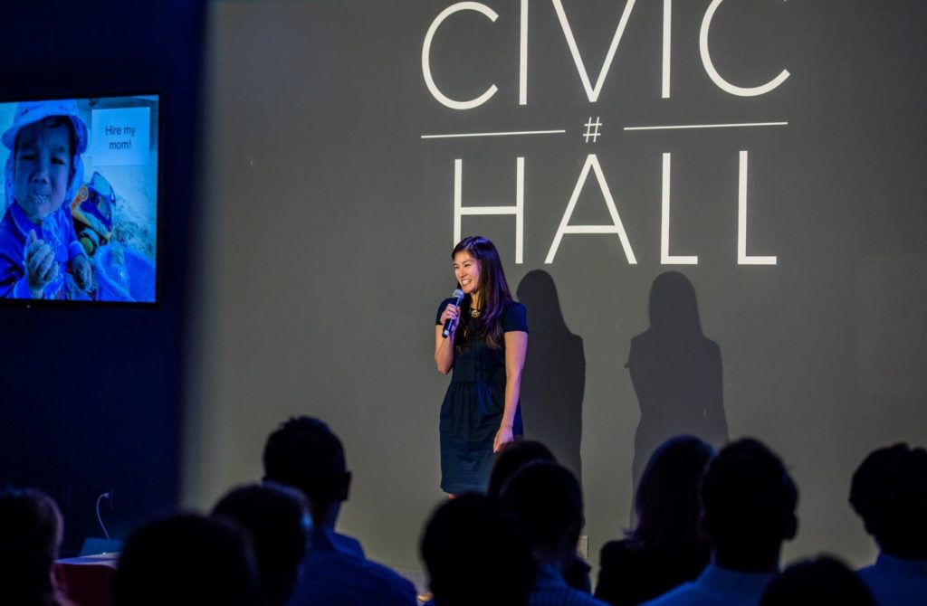 Facing my biggest fears with a one-minute pitch and my son by my side. Photo via Startup Institute Facebook