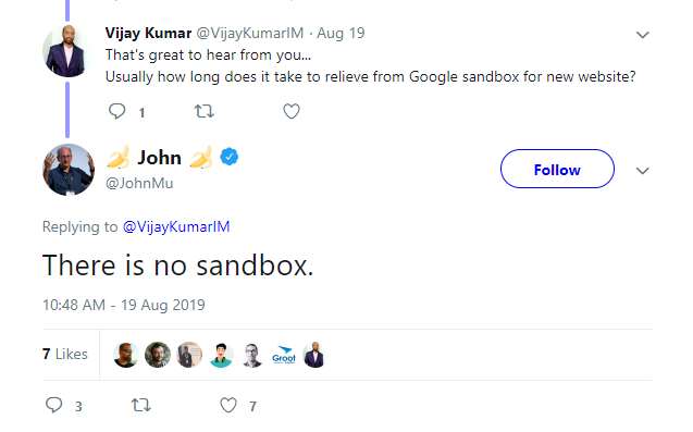 The image is a screenshot of a Twitter exchange between two users discussing the concept of the Google sandbox for new websites. The text of the tweets is as follows: Tweet by Vijay Kumar (@VijayKumarIM) on August 19: "That's great to hear from you... Usually how long does it take to relieve from Google sandbox for new website?" Engagement: 1 like Reply by John (@JohnMu) on August 19: "There is no sandbox." Timestamp: 10:48 AM · 19 Aug 2019 Engagement: 7 likes, 3 retweets The reply is highlighted by the user's profile picture and verification checkmark, indicating it is a response from a verified account.